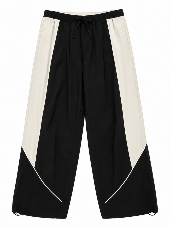 Black Relaxed Wide-Leg Track Pants with White Side Panels and Chevron Stripe